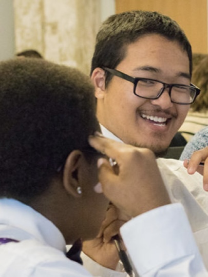 two students laughing together