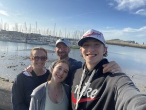 family taking a selfie by a waterway