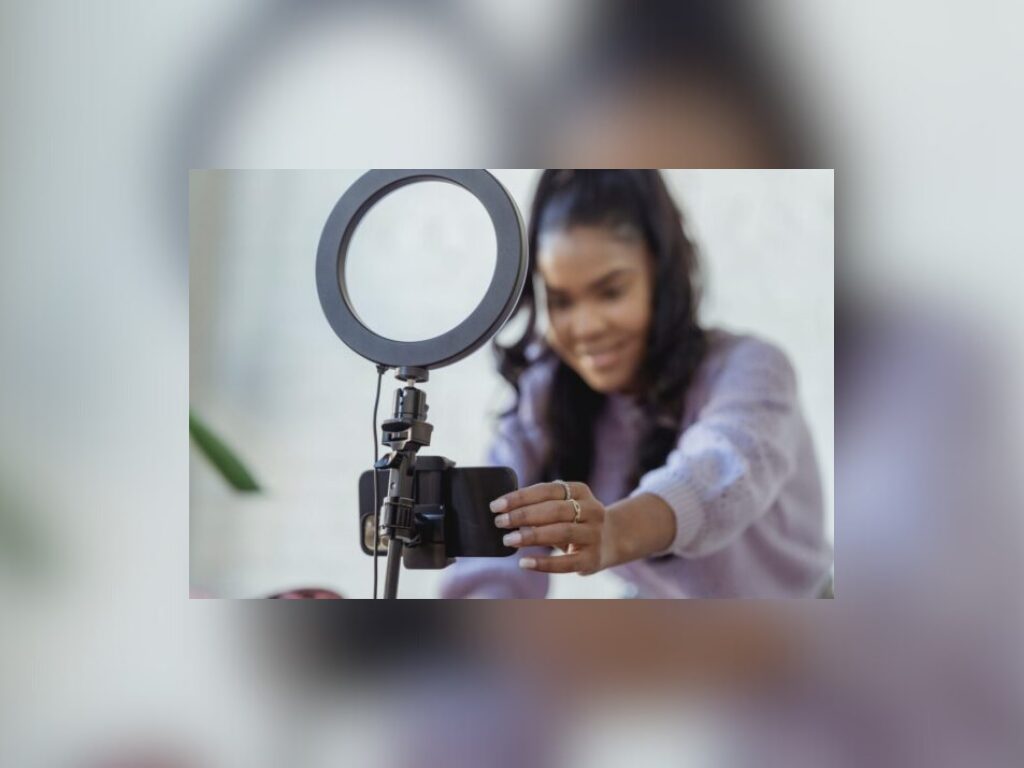 influencer with camera and ring light