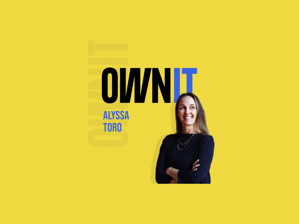woman standing against a yellow background