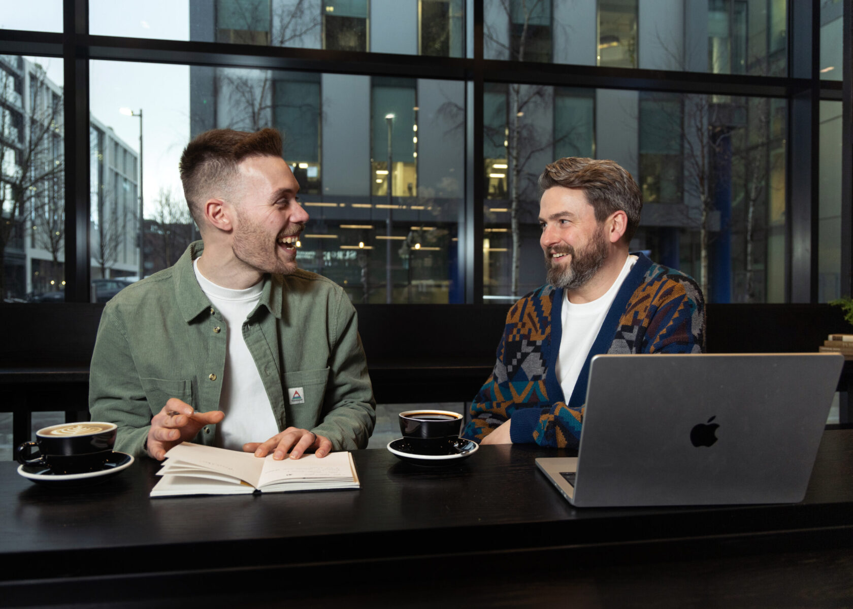 two guys drinking coffee